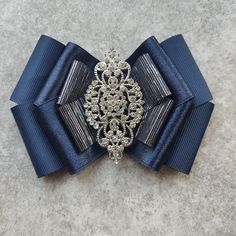 ★ Beautiful Luxurious Handmade Woman Brooch ★ Size about : width 10cm ★ Everyday wear or special occasion ★ Strong and secure ★ Color ; Navy blue , Silver Stone ★ Perfect for a gift Blue Brooch, Glamour Jewelry, Sweater Clips, Tie For Women, Sweater Clip, Jewelry Brooch, Brooch Jewelry, Shoe Clips, Creative Studio