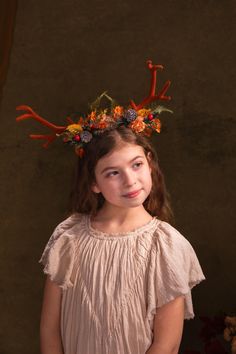 Flower crown with antlers in autumn design :) The flower crown is made of preserved and artificial flowers, grass, antlers and other arranging material. When stored in dry and dark place, our products last 10-15 years. We can also make you other matching accessories. Please message me for more information. :) Photo: Michaela durisova photography Model: Thalia Kráľ ---------------------------------------------------------------- SHIPPING INFO FOR EU ORDERS: Standard shipping: Your package will ar Crown With Horns, Fairytale Crown, Autumn Flower Crown, Autumn Crown, Antler Crown, Fall Flower Crown, Halloween Crown, Pagan Festivals, Fairy Crown