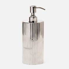 a silver soap dispenser on a white background