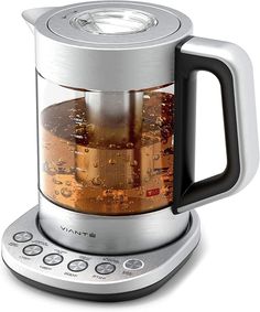 an electric tea maker is shown on a white background