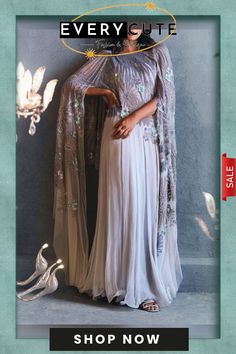 Three-dimensional Embroidered Organza Maxi Dress Festive Dress With Sheer Dupatta And Cape, Festive Cape Dress For Eid, Festive Anarkali Dresses With Cape Shape, Festive Anarkali Dresses With Cape Style, Festive Anarkali Cape Dress, Cape Dresses For Eid Party, Cape Dresses For Evening Eid Celebrations, Evening Cape Dress For Eid, Anarkali Party Dress With Cape