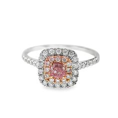 18K White Gold Fancy Pink Diamond Classic Ring 1 Pink Diamond - 0.18 CT Diamonds - 0.51 CT (VS, F Colour) 18K White Gold - 2.57 GM The pink diamond is a captivating and rare gemstone, its hue evoking the most delicate and precious things in nature. Regarded as one of the most sought-after diamonds, the pink diamond is a symbol of elegance, exclusivity, and refined taste. We have meticulously selected a single 0.18 carat diamond with a rich, vibrant hue to create a captivating piece. By expertly pairing this vivid pink diamond with sparkling white diamonds, we have achieved a harmonious balance of color and brilliance that is truly mesmerizing. Fashion Ring & Engagement Ring & Lovers' Gift Pink Gold Diamond Ring With Vvs Clarity, Luxury Pink Diamond Ring For Gift, Gift Pink Diamond Ring With Vvs Clarity, Luxury Pink Rings With Diamond Accents, Pink Diamond Engagement Ring 1stdibs, Classic Diamond Ring, Amethyst Ring Engagement, Purple Diamond, Platinum Diamond Rings