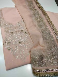 Item Overview ATHARVA Hand Embroidered Salwar Kameez w/Neck Work in Pink Peach/Gota Patti Dupatta/Custom Stitch/Wedding/Churridar/Anarkali/Patiala/ Dno. Ch1569 Fabric: * Shirt Chanderi Silk - Pink Peach 2.5 Mts Hand Embroidere Neck * Dupatta: Chiffon Chinnon Dupatta 2.5 mtr/Pink Peach * Bottom Santoon Silk 2.5 Mts. Excusive Hand Embroidered Party Wear Punjabi Suit. Customization: * Fabrics Customization: Designs Can be made in different Fabrics. *Color Customization: Designs Can be made in diffe Pink Chinon Salwar Kameez For Wedding, Peach Georgette Sets With Zari Work, Elegant Pink Churidar For Wedding, Peach Wedding Sets With Resham Embroidery, Peach Wedding Dress With Dupatta, Unstitched Peach Sets With Zari Work, Pink Salwar Kameez With Dabka Work For Wedding, Peach Resham Embroidery Sharara For Wedding, Peach Sharara With Resham Embroidery For Wedding