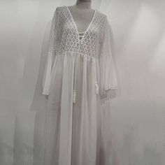 Long Flare Sleeve V Neck White Tassel Hollow Boho Lace Maxi Dress




Size
One size
M
L
XL
XXL


US
-
6-8
10-12
14-16
18-20


UK
-
8
10
12
14


AU
-
8
10
12
14


EU
-
38
40
42
-


Length/cm
140
-
-
-
-


Sleeve Length/cm
38
-
-
-
-


wasit/cm
80-130
-
-
-
-


Shoulder/cm
-
-
-
-
-


Bust/cm
100-120
-
-
-
-


Underwear/cm
-
-
-
-
- Boho Lace Maxi Dress, White Lace Maxi Dress, White Tassel, Dress Bohemian, Boho Lace, Boho Designs, Sleeve Maxi Dress, Boho Maxi, Lace Maxi