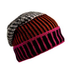 The Atlantic Hat is a bold, multicolor beanie designed to make a statement. With its vibrant mix of patterns and colors, this one-of-a-kind hat is hand-knit from 100% Merino Wool and fully lined with soft  fuzzy fleece, ensuring both warmth and standout style. Perfect for adding a splash of color to any winter outfit, the Atlantic Hat is an eye-catching accessory that combines comfort and personality in one striking design. 100% Wool Lined with fleece Hand wash in cold water Multicolor Beanie, Unique Beanies, Knitting Accessories, The Atlantic, Relaxed Style, Winter Outfit, Color Splash, Hand Knitting, Merino Wool