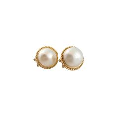 This gorgeous set of 14K gold earrings features a beautiful 16mm Mabe pearl on each earring! Size: 20mm X 20mm X 11.5mm Weight: 12.72 g/ 8.2 dwt Hallmark: 585 KS Very good condition, professionally polished. Will come packaged in a gift box or pouch (when possible) and will be shipped U.S. Priority Mail Insured. MM053123/17KCS Classic Gold Cabochon Earrings, Elegant 14k Gold Round Clip-on Earrings, Classic Round Pearl Clip-on Earrings, Elegant Yellow Gold Clip-on Earrings With Cabochon, Elegant Yellow Gold Cabochon Earrings, Formal Round Pearl Pendant Earrings, Round Clip-on Pearl Earrings, Timeless Round Pearl Pendant Earrings, Elegant White Gold Earrings With Cabochon