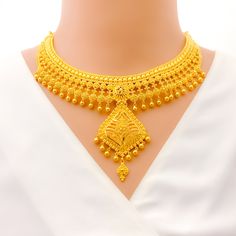 This 22k gold necklace set features an imperial vintage charm design, perfect for adding elegance to any outfit. Weighing 75.5 grams, it showcases a yellow gold finish that enhances its intricate and regal appearance. The set has a length of 17 inches with a 2.5-inch drop and includes adjustable 1.5-inch links for a comfortable fit. Secured with a hook lock, it combines style and practicality. The matching earrings, each 2.3 inches long, feature screw back posts for added security. Ideal for tho Heavy Gold Kundan Necklace For Formal Occasions, Gold Kundan Necklace For Festivals And Formal Occasions, Ornate 22k Yellow Gold Kundan Necklace, Heavy 22k Yellow Gold Jewelry Sets, Ornate Kundan Necklace In 22k Yellow Gold, Gold-plated Temple Necklace For Festivals, 22k Gold Kundan Necklace For Formal Occasions, Gold Kundan Necklace In 22k For Formal Events, Ornate 22k Yellow Gold Temple Necklace