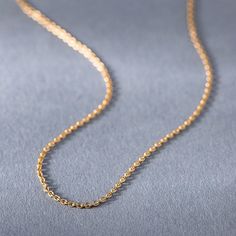 Introducing the Radiance 14kt, 18kt Gold Chain, a stunning piece of jewelry designed for elegance and versatility. This gold necklace is perfect for adding a touch of luxury to your everyday outfits or for special occasions. The Radiance Gold Chain is not just a piece of jewelry; it's a statement of elegance and sophistication. Whether you are looking for a gift for a loved one or a special treat for yourself, this gold necklace is the perfect choice. Its minimalist design ensures that it can be Gold Chain Designs For Women, Statement Jewelry Outfit, Gold Statement Jewelry, Necklace For Everyday, Gold Chain Design, Yellow Rose, Elegant Gift, Statement Jewelry, Everyday Outfits