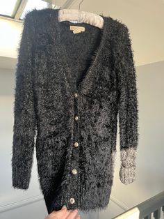 Black and gold sparkly cardigan, fits size S Chic Fall Party Cardigan, Chic Fall Cardigan For Party, Glamorous Fitted Sweater For Winter, Chic Winter Party Cardigan, Glamorous Winter Cardigan For Night Out, Glamorous Fall Sweater For Night Out, Chic Winter Cardigan For Party, Fitted Glamorous Winter Sweater, Glamorous Winter Sweater For Night Out