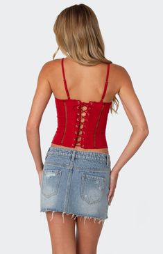 Online only! Turn heads with the Jennie Ladder Knit Corset from Edikted, boasting adjustable straps and a flattering cupped construction for a perfect fit. Adorned with intricate ladder knit detailing and a sultry lace-up back closure, this corset combines chic style with undeniable allure for a look that commands attention.


	Corset
	Adjustable straps
	Cupped construction
	Lace up back closure
	Ladder knit detailing
	Polyester, Spandex
	Model wears size S
	Model height is 5'8
	Item care: Wash with similar color Knit Corset, Slim Fit Cargo Pants, Dad Jeans, Curve Jeans, Swimwear Dress, Jeans Kids, Low Rise Jeans, Kids Swimwear, Slim Fit Pants