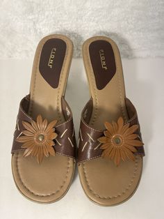 Fioni-90's/Y2k Vintage, Brown, Leather, Beige Floral, Open Toe,  Made In Brazil, 3" Heel, Sandals. Size-6.5 Condition-Excellent Retro Brown Sandals For Beach, Retro Brown Sandals For The Beach, Vintage Brown Wedge Sandals For The Beach, Brown Retro Summer Wedge Sandals, Brown Retro Wedge Sandals For Summer, Vintage Style Synthetic Sandals For Summer, Vintage Synthetic Heels For Summer, Vintage Brown Wedge Sandals For Spring, Brazil Clothing