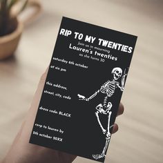 someone holding up a card with a skeleton on it that says rip to my twenties