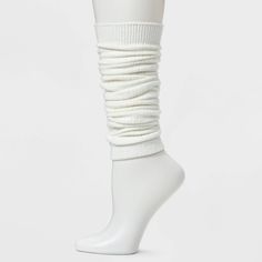 Keep cozy and stylish with the Women's Ribbed Supersoft Leg Warmer Boot Socks - Universal Thread™ 4-10. These socks offer a snug fit with a ribbed design that adds texture and warmth. The supersoft material feels great against your skin, making them ideal for chilly days. Wear them with boots or around the house for extra comfort and a touch of effortless style. Universal Thread™: Found exclusively at Target. Stretch White Knee-high Socks For Fall, White Stretch Knee-high Socks For Fall, Cream Fitted Cozy Socks, Cozy Fitted Cream Socks, Cozy Snug Fit Soft Knee-high Socks, White Knee-high Comfortable Leg Warmers, White Warm Knee-high Socks, Comfortable White Knee-high Leg Warmers, Warm Fitted Cozy Socks