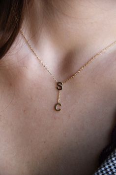 Build this custom layered double initials necklace with your name and surname first letter. All on a dainty cable link chain letter necklace available in gold filled, white and rose gold filled. This makes for the perfect bespoke necklace with a dangle 2 initials Each letter height is 6mm Chain length between two letters is 1cm ∙Our Motto We truly believe that the best designs come from ideas that are simplicity and timeless When we design a jewelry, we make you high quality pieces that will las Double Initial Necklace, Simple Gold Initials Name Necklace, Simple Gold Name Necklace With Initials, Letter Necklace Initials, Initials Necklace, Chain Letter, Necklace Quotes, Gold Letter Necklace, Necklace Layered