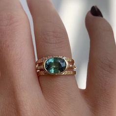 Teal Sapphire Engagement Ring with Delicate Diamond Detailing - OOAK – ARTEMER Teal Sapphire Engagement Ring, Teal Sapphire, Sapphire Engagement Ring, Baguette Cut Diamond, Sapphire Engagement, Engagement Rings Sapphire, Brilliant Cut Diamond, Oval Cut, Diamond White