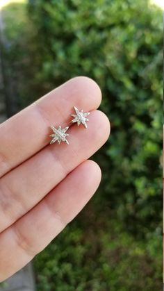 Sterling Silver Starburst Earring Studs. Made of Solid Sterling Silver, and cubic zirconia. Platinum plated over sterling silver. Size: 7mm, 10mm Sold as a pair Comes with gift box. Sterling silver butterfly earring backs, and extra couple pairs of silicon earring backs will be included. Hypoallergenic, safe for sensitive skin. DUE TO HYGIENE REASONS, PLEASE UNDERSTAND NO RETURNS ON THE EARRINGS. BUT PLEASE CONTACT US IF YOU ARE NOT SATISFIED WITH YOUR PURCHASE. CUSTOMER SATISFACTION IS THE NUMB Sparkling Silver Starburst Jewelry, Star-shaped Cubic Zirconia Jewelry With Matching Earrings, Starburst Cubic Zirconia Jewelry Gift, Silver Star-shaped Diamond Earrings As Gift, Silver Star-shaped Diamond Earrings For Gift, Sterling Silver Star-shaped Diamond Earrings, Starburst Earring, Silver Butterfly Earrings, Silver Sisters