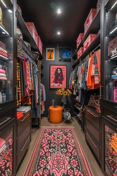 a walk in closet with lots of clothes and rugs