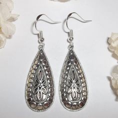 Don't You Just Love The Ornate Design Of These Handmade Nwt Statement Earrings? I Made These With Silver Toned Costume Jewelry Teardrop Shaped Charms That Are Antiqued In Black To Show Off The Details. They Dangle And Drop From 925 Sterling Silver French Fish Hooks Ear Wires For Pierced Ears. 2 1/8 Inch Tall And About 5/8 Inch Wide. The Approximate Weight Of Each Single Earring Is About 3.3 Grams. You Can Wear Them With Any Colored Outfit! Fashion Accessory Unique Funky Bohemian Boho Rustic Styl Hypoallergenic Metal Teardrop Earrings For Party, Silver Metal Teardrop Pendant Earrings, Silver Bohemian Teardrop Dangle Earrings, Vintage Silver Teardrop Earrings, Vintage Silver Teardrop Pierced Earrings, Silver Hypoallergenic Teardrop Earrings For Party, Hypoallergenic Silver Teardrop Earrings For Parties, Nickel Free Silver Teardrop Pendant Earrings, Nickel-free Silver Teardrop Earrings For Party