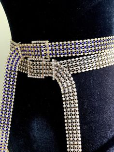 Gorgeous Rhinestone belt! the perfect statement piece to spark any outfit.Available with Black or blue rhinestones.💎Adjustable 💎 Belt width : 1.37” ( 3.5 cm ) 💎 Buckle width : 1.77 “ (4.5cm)  💎 Length:41’ inchesFollow us in Instagram: @kyboutique4SHARE YOUR PICTURES IN INSTAGRAM #kyboutique4Website: Visit un also on the webwww.kyboutique4.com Please make sure to read my Shipping Terms & Conditions Information prior to making a purchase. Adjustable Silver Belt With Bling, Adjustable Silver Belts With Bling, Luxury Silver Belt With Rhinestones, Silver Bling Belts For Party, Silver Adjustable Belt With Rhinestones, Silver Party Belt With Bling, Silver Rhinestone Belt For Party, Silver Rhinestone Belts For Formal Occasions, Adjustable Rhinestone Party Belts