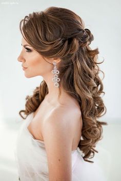 an image of a woman with long hair in her wedding dress on the instagram page