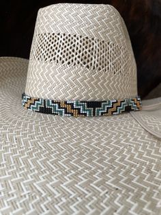 "5/8\" Wide Aztec Green and Gold Hat Band. All beadwork is beaded with 10lb extreme braided nylon line. All hat bands are finished at 23\" with glued than sewed down leather ends and an adjustable leather tie." Adjustable Braided Hat For Rodeo, Multicolor Beaded Hats For Rodeo, Adjustable Braided Western Hat, Western Style Adjustable Braided Hat, Adjustable Multicolor Ranch Hats, Western Braided Hat Band With Flat Brim, Western Style Adjustable Handwoven Hat Band, Western Braided Hat Band For Festivals, Adjustable Handwoven Hat Bands For Rodeo