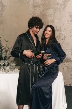 Unite comfort and connection with our family robes, including a matching dressing gown for him--an ideal gift that celebrates togetherness in luxurious comfort. Embrace moments of shared relaxation with our men's dressing gown, designed for style and warmth, perfect for family bonding. ✂ About us: ♥ Est. 2017 ♥ Based in Lincolnshire, UK ♥ Handmade in Europe ♥ Small family run brand ♥ Handmade in Europe ♥ Sustainable and ethical production ♥ We support local craftsmanship ♥ Sizes for all body typ Family Robes, Gown Christmas, Robes Satin, Robes Silk, Mens Dressing Gown, Satin Dressing Gown, Luxury Robes, Matching Robes, Men's Robes