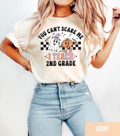 Comfort Colors Teacher Halloween Shirt, Halloween Teacher Shirt, Spooky Teacher T-shirt, Teacher Shirt, Halloween School Shirt *How To Order* 1. Check photos for sizing and color options 📏 2. Select size and color from the drop-down menus ✨ 3. Add your grade/custom text in the personalization box ✨ 4. Add to cart & Place order 🛒 *PRODUCTION TIME* 1-5 days (Usually 2 days) *SHIPPING TIME* 2-5 days *PRODUCT DESCRIPTION* -Unisex T-Shirt -Comfort Colors Brand -100% cotton -Light/medium weight and extremely soft, this shirt is  sure to be your next favorite t-shirt. For T-shirt Sizes Please refer to the Listing Image. *CARE INSTRUCTION* Turn the shirt inside out and wash with cold water.  We recommend air drying, but can be placed in  dryer (lower heat is preferred). *PRINTING METHOD* DTG pri Halloween Shirts For Teachers, Halloween Teacher Shirts, Teacher Fits, Teacher Halloween, Teachers Halloween, Kindergarten Ideas, Halloween School, Halloween Shirts, Teacher Tshirts