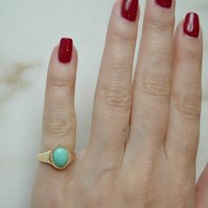 The Diamond & Turquoise Cabochon Signet Ring is made for a “pinky up” moment. Featuring just over one carat of juicy cabochon turquoise surrounded by a diamond-encrusted border, this ring is pastel perfection. Heirloom Oval Turquoise Cabochon Ring, 14k Yellow Gold Turquoise Cabochon Ring, Fine Jewelry Turquoise Ring With Oval Cabochon, Classic Yellow Gold Turquoise Cabochon Ring, Classic Cabochon Turquoise Ring In Yellow Gold, Classic Turquoise Oval Cabochon Jewelry, Anniversary Turquoise Cabochon Ring In Yellow Gold, Heirloom Yellow Gold Turquoise Cabochon Ring, 14k Gold Turquoise Cabochon Ring