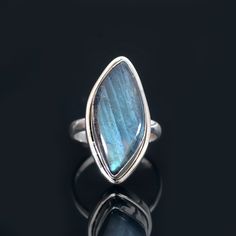 Labradorite Ring Metal- Sterling Silver Stone Cut- Oval Ring Size- 8 US Weight- 7.28 Gm ABOUT LABRADORITE- Wearing or carrying Labradorite allows one's natural magical abilities to manifest. It improves mental and intuitive talents such as clairvoyance, telepathy, prophesy, and coincidence control, and it aids in communication with higher guides and spirits in Akashic records, psychic readings, and past-life recollection. It facilitates travel between worlds and allows for a safe and grounded return to the present. Labradorite Jewelry With Bezel Setting As Gift, Labradorite Jewelry With Bezel Setting For Gift, Untreated Labradorite For Jewelry Making, Magical Abilities, Silver Pinky Ring, Ring Marquise, Akashic Records, Labradorite Jewelry, Oval Ring