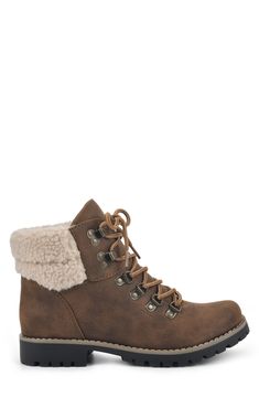 Whether you're ready to enjoy outdoor walks or need something warm and comfortable for city excursions, the Pathfield from Cliffs by White Mountain Shoes ankle boot is the ideal choice to keep you fashionably warm. This hiker-inspired style has rugged utility yet adds a touch of comfort with a sweater cuff to ensure it'll pair perfectly with all of your favorite winter outfits. 1.25" heel; 0.5" platform 5" shaft height; 11" opening circumference Lace-up closure Cushioned insole Round toe Knit co Rugged Combat Boots For Fall Outdoor Activities, Winter Lace-up Ankle Boots With Lug Sole, Rugged Lace-up Boots For Outdoor Fall Activities, Ankle Hiking Boots For Fall, Fall Hiking Ankle Boots, Fall High-top Lace-up Boots For Outdoor Activities, High-top Lace-up Boots For Fall Outdoor Activities, Brown Moto Boots For Outdoor Winter Use, Rugged Boots For Outdoor Activities In Fall