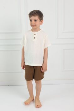 Our shorts are designed with a relaxed fit and an elastic waistband, allowing for easy movement and a great fit. The lightweight and breathable nature of the muslin fabric ensures that your child stays cool and comfortable all day long. Made from 100% organic cotton, our shorts are hypoallergenic, making them suitable for sensitive skin. They are also easy to care for, simply machine wash them in a short program at a maximum of 30oC. At Cuckoo Cotton, we prioritize the comfort and happiness of o Casual Tops With Elastic Waistband For Play, Cotton Tops With Elastic Waistband For Playwear, Basic Cotton Shorts For Summer, Summer Playwear Tops With Elastic Waistband, Summer Cotton Tops With Elastic Waistband, Summer Playwear Bottoms With Relaxed Fit, Vacation Cotton Tops With Elastic Waistband, Cotton Tops With Elastic Waistband For Vacation, Casual Cotton Playwear Shorts