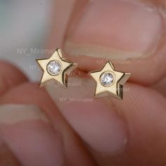 Small Star Stud Earrings Genuine SI G-H Solitaire Diamond Studs 14K Solid Gold Celestial Star Earrings Minimalist Birthday Gift For Her * SKU: ST00240_14876 (SGT00604) * Made to Order:-  * Gold Purity: 14K Solid Yellow Gold (stamped) * Custom Gold Color: Rose Gold, Yellow Gold, White Gold * Custom Gold Purity: 10K/14K/18K (Charges Apply) * Diamond 100% Genuine Diamond * Diamond Weight: 0.07 ct. * Diamond Color: G-H * Diamond Clarity: SI1- SI2 * Diamond Cut: Brilliant Cut (Excellent) Product Meas Hypoallergenic 14k Gold Star Jewelry, Anniversary Yellow Gold Earrings With Star Charm, Minimalist 14k Gold Earrings With Star Charm, Anniversary Yellow Gold Star Charm Earrings, Minimalist 14k Gold Star Charm Earrings, 14k Gold Star-shaped White Gold Earrings, 14k White Gold Star Earrings, Fine Jewelry Star-shaped Earrings For Anniversary, Dainty 14k Gold Earrings With Star Charm