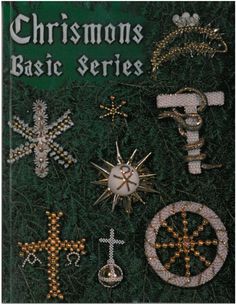 the christmas basic series is shown in gold and silver, with cross decorations on it