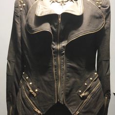 Dramatic Gold Studded Faux Leather Jacket. Warm Up Any Outfit With This Stunner! Edgy Fitted Outerwear With Rivets, Fitted Outerwear With Rivets For Party, Fitted Rivets Outerwear For Party, Fitted Party Outerwear With Rivets, Fitted Spring Outerwear With Rivets, Fitted Outerwear With Rivets For Fall, Trendy Fitted Outerwear With Rivets, Gothic Black Outerwear With Zipper Closure, Black Gothic Outerwear With Zipper Closure