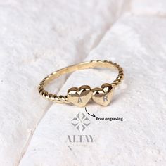 ABOUT PRODUCT  This 14K Gold Heart Ring is suitable gift for girlfriend, mom and her. You can even buy as a birthday gift for your friends or anniversary gifts, If you want to add a special note we can write for you and put to inside of package. We manufacture our jewelry pieces with carefully and after production we double checking in quality control department. Our main idea is keep our items for daily wearing especially for minimalist jewelry pieces. 14K Gold Heart Ring, Tiny Hearts Stacking Ring, Double Heart Dainty Ring, Custom Heart Ring, Personalized Initial Ring, Promise Love Band, Gift For Her, Christmas, New Year, Mothers Day, Valentines Day, Anniversary, Birthday Gift. ITEM DETAILS Material: 14K Gold Approx: 1.50 gram Available colors: Gold, Rose Gold, White Gold. Available Size Adjustable Heart Cut Ring For Valentine's Day, Adjustable Heart Cut Rings For Mother's Day, White Gold Heart Ring For Mother's Day Gift, Stackable Yellow Gold Heart Ring As Gift, Stackable White Gold Heart Ring For Anniversary, Heart-shaped Sterling Silver Ring For Anniversary, Heart-shaped Stackable Jewelry For Anniversary, Personalized White Gold Heart Ring For Mother's Day, Personalized White Gold Heart Promise Ring