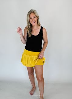 Gear up for the next big game with our Catlett High Waisted Gold Skort — where style meets fandom! Bring you loudest cheer for your team in style with this adorable skirt! Available in sizes small, medium, and large Color: Gold Fitted waistband Amy is 5'8" and has a 27 waist. She is wearing a medium Runs true to size. Shorter length Pleated detail 90% Polyester, 10% Spandex ** ALL CLEARANCE ITEMS ARE FINAL SALE AND CAN NOT BE RETURNED OR EXCHANGED Big Game, Equatorial Guinea, Guinea Bissau, British Indian, Mozambique, Brunei, In Style, Final Sale, The Next