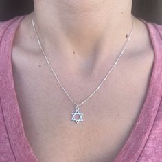 A beautiful Star of David necklace comes in a unisex design. Both the necklace and the pendant are handmade from 925 Sterling Silver. Great as a gift for a  Bat mitzvah, Hanukkah, birthday, or holiday. This jewelry comes wrapped in a nice package and is ready to be given as a gift. ❤ 𝗠𝗘𝗔𝗦𝗨𝗥𝗘𝗠𝗘𝗡𝗧𝗦 ❤ Pendant width: 0.47"/ 1.2 cm. Pendant length: 0.47"/ 1.2  cm. Please choose your length from the drop-down list. ❤ 𝗠𝗬 𝗦𝗧𝗢𝗥𝗘 ❤ For more Judaica pendant necklaces: http://bit.ly/3UBSk Sterling Silver Symbolic Necklace With Star Charm, Symbolic Sterling Silver Star Charm Necklace, Spiritual Necklaces With Star Charm As Gift, Sterling Silver Star Of David Jewelry Gift, Handmade Sterling Silver Star Of David Jewelry, Sterling Silver Star Charm Necklace, Handmade Sterling Silver Star Of David Necklace, Handmade Star Shaped Sterling Silver Necklace, Nickel-free Sterling Silver Star Of David Necklace