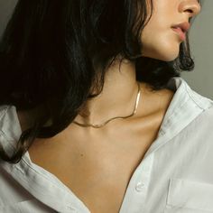 Add a touch of luxury to your everyday look with our Herringbone Chain Necklace. This timeless piece is crafted from 14k Gold Filled and designed to last. Layer it with your other favorite necklaces for a trendy look. Materials: Material: 14k Gold Filled Chain Thickness: Approx 1.00mm Clasp: Lobster Clasp Chain Style: Herringbone Length: 16 inches Color: Gold Have a question to ask? Contact us and we can help you! hello@danielajanette.com Question To Ask, Herringbone Chain, Recycled Gold, Gold Filled Chain, Chain Styles, Gold Vermeil, Timeless Pieces, Everyday Look, Herringbone