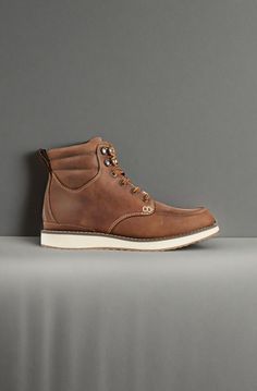 A rugged, workwear-inspired moc toe leather boot with sneaker-like comfort and all-day support. Order regular shoe size. (For half sizes not offered, order up to next whole size). Suggested Sock: Midweight. Padded collar and gusseted tongue to keep out debris. Waterproof Nor'easter leather for weather and stain protection. Lightweight, molded EVA midsole and outsole for lightweight comfort. Synthetic lining is moisture wicking and fast drying. Molded rubber perimeter outsole for traction and dur Rugged Steel Toe Boots In Oiled Leather, Rustic Lace-up Leather Work Boots, Rugged Waterproof Boots With Reinforced Moc Toe, Rugged Round Toe Work Boots For Outdoor Work, Rugged Waterproof Boots With Moc Toe And Reinforced Toe, Oiled Leather Work Boots With Steel Toe For Outdoor, Rustic Boots With Reinforced Moc Toe, Rustic Moc Toe Boots With Reinforced Toe, Outdoor Steel Toe Oiled Leather Boots