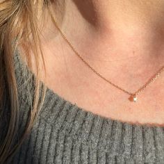 Introducing our TINY DEW DROP NECKLACE - the perfect piece for adding a subtle sparkle to any outfit. With a delicate and dainty necklace design, this piece features a tiny diamond that will catch the light just right and add a touch of elegance to your look. Trust our expertise in crafting high-quality, beautiful jewelry. 14k solid gold Dainty Diamond Drop Necklace With Delicate Chain, Delicate White Diamond Necklace For Everyday, Delicate Diamond Drop Necklace With Delicate Chain, Delicate White Diamond Necklace With Delicate Chain, Dainty Diamond Necklace With Delicate Chain In Diamond White, Dainty Diamond White Necklace With Delicate Chain, Minimalist Birthstone Necklace With Diamond Accents, Delicate Single Diamond Necklace, Delicate Diamond White Solitaire Necklace