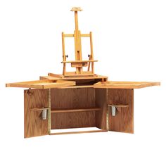 a wooden desk with drawers and an easel on it's top, in front of a white background