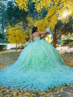 Receive lots of compliments in this floral glitter applique long strapless corset dress with an A-line skirt from LizLuo Quince by the House of Wu 26094. This stunning quinceañera ball gown boasts a one-of-a-kind beaded pattern that accentuates the entire bodice. The basque waistline shapes and frames the full ball gown skirt, while the floral glitter fabrics create an ultimate sparkle effect. Additionally, sheer ruffle fingerless gloves add a sweet touch to the ensemble. House of Wu LizLuo Quin Neon Quinceanera Dresses, Sweet 16 Dress Green, Teal Quinceanera Dresses, 1500 Dresses, Strapless Corset Dress, Cotillion Dresses, Strapless Ball Gown, Quinceñera Dresses, Debutante Ball