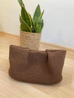 👜Discover elegance and sustainability in one beautiful accessory with our Elegant Chocolate Brown Raffia Rope Clutch Bag.  The rich, chocolate brown hue complements a myriad of colors, making it a versatile addition to your wardrobe. ✔️The rope design not only adds a unique texture but also gives the bag a modern, bohemian flair that stands out. It's not just a bag--it's a statement piece that elevates your style while keeping your essentials secure. 📌Technical Details: For Small Size: Width : Elegant Brown Bucket Bag With Rolled Handles, Elegant Brown Beach Bag For Vacation, Elegant Brown Summer Beach Bag, Elegant Tote Beach Bag With Braided Handles, Elegant Beach Bag With Braided Handles, Elegant Beach Shoulder Bag With Braided Handles, Elegant Shoulder Beach Bag With Braided Handles, Crochet Top Handle Bag With Removable Pouch For Vacation, Elegant Brown Straw Bag For Daily Use