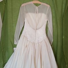 All Offers Considered. Nwt Vintage Yolanda Wedding Dress, Ivory, Full Skirt, 55" Armpit To Floor, Skirt Apprx 240" Diameter, Built In Triple Layer Crinoline Slip, Cloth Covered Buttons, Invisible Zip...Absolutely Stunning Fitted Long Sleeve Wedding Dress For Debutante Ball, Fitted Dress With Sheer Bodice For Ceremony, Wedding Ball Gown For Ceremony, Cream Wedding Dress With Boned Bodice, Fitted Ball Gown Wedding Dress For Ceremony, Classic Wedding Dress With Lace Bodice, Cream Gown With Boned Bodice, Long Sleeve Lace Trim Wedding Dress, Cream Gown With Fitted Boned Bodice