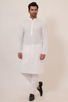 all over paired with contrast white pyjama.  MateriWhite kurta with chikankari embroideryal: Cotton Tags: Kurtha,Payjama,Mens Indian wear,Indian mens clothing,mens wear online,online kurtas,online kurthas,kurtas collection,south Indian mens wear,south Indian clothing,mens traditional wear.,mens kurtha payjama. Note: Colors may slightly vary due to photographic lighting. Please contact us if you have any questions via email,social media,text or whatsapp message on 425-698-9400. White Lakhnavi Kurta Design, White Straight Kurta Salwar Kameez For Eid, White Cotton Long Sleeve Kurta, White Dabka Sets For Diwali, White Dabka Sets For Eid, Casual Unstitched Kurta With Chikankari Embroidery, White Traditional Wear With Chikankari Embroidery For Eid, White Dabka Kurta For Festive Occasions, White Dabka Straight Kurta