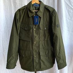 Polo Ralph Lauren Zip Down Combat Green Raincoat Jacket. Men's Size Medium. Brand New With Tags. Authentic Polo Ralph Lauren Item Will Be Packed Securely & Shipped Quickly. Please Let Me Know If You Have Any Questions! Green Utility Jacket With Flap Pockets For Winter, Green Outdoor Outerwear With Patch Pockets, Green Outerwear With Patch Pockets For Outdoor, Winter Olive Utility Jacket With Flap Pockets, Military Winter Outerwear With Patch Pockets, Olive Utility Outerwear With Patch Pockets, Green Outerwear With Flap Pockets For Outdoor, Olive Long Sleeve Outdoor Outerwear, Olive Long Sleeve Outerwear For Outdoor