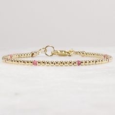 Pink Tourmaline, Gold Beaded Bracelet, Delicate Dainty Minimalist Elegant Luxury Women's Jewelry, Daily Wear Stacking Bracelet, Gift for Her Pink tourmaline bracelet with your choice of metal.  Stacks well with other metal or gemstone bracelets. Available in 14k gold filled, sterling silver or 14k rose gold filled. 2.0mm metal beads and 2mm faceted garnet. Choose your length  Measure your wrist and then add 1/2 inch.  This will give you a good guide for a comfortable fit. 6.0 inches child size 6 Gold Beaded Bracelet, Tourmaline Bracelet, Gold Bead Bracelets, Tourmaline Beads, Gemstone Bracelets, Bracelet Stack, Metal Beads, Luxury Women, Pink Tourmaline