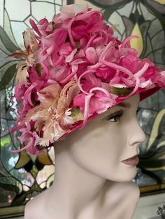 This 1960s floral hat is in lovely condition complete with its original receipt dating it to the 1960s.  The inside label is marked Royers Dept Store which is also marked on the receipt.  Royers was a women's clothing store located in Greensburg, PA.  It was known for carrying fine quality clothing and accessories for women. The hat is covered with beautiful tones of pink and beige  florals. It is a bucket style and completely covered in flowers.  The outside brim measures 28".  The interior measures 21". This fine piece of millinery would be perfect for tea parties, props or display! Item will be shipped free to US destinations. Glass Feather, Floral Bucket Hat, Floral Hat, Millinery Hats, Tea Parties, Womens Clothing Stores, Vintage 1960s, Quality Clothing, Retro Style