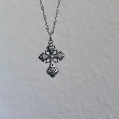 Gift your Catholic friend a stunning religious jewelry piece with this dainty silver cross necklace, perfect for women seeking minimalist elegance with a touch of charm from Silver Coquette Jewelry 𝐃𝐄𝐓𝐀𝐈𝐋𝐒:  ⭐️ Necklace lengths available 14" 16" 18" 20" ⭐️ Pendant size is 1" ⭐️ The silver cross charm is silver plated over alloy. The chain necklace is up on stainless steel, safe for those with sensitive skin ⭐️ Perfect for an everyday dainty cross necklace, The Royal Bliss cross necklace Sterling Silver Clavicle Chain Cross Necklace, Sterling Silver Crucifix Cross Necklace With Adjustable Chain, Minimalist Cross Pendant Necklace With Clavicle Chain, Silver Cross Necklace With Adjustable Chain, Silver Necklace With Delicate Chain And Cross Pendant, Silver Cross Pendant Charm Necklaces, Silver Minimalist Cross Necklace With Clavicle Chain, Silver Cross Clavicle Chain Necklace, Silver Cross Necklace With Clavicle Chain