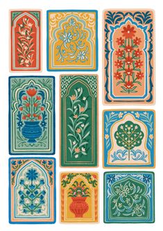 six different colored tiles with flowers and vases on them